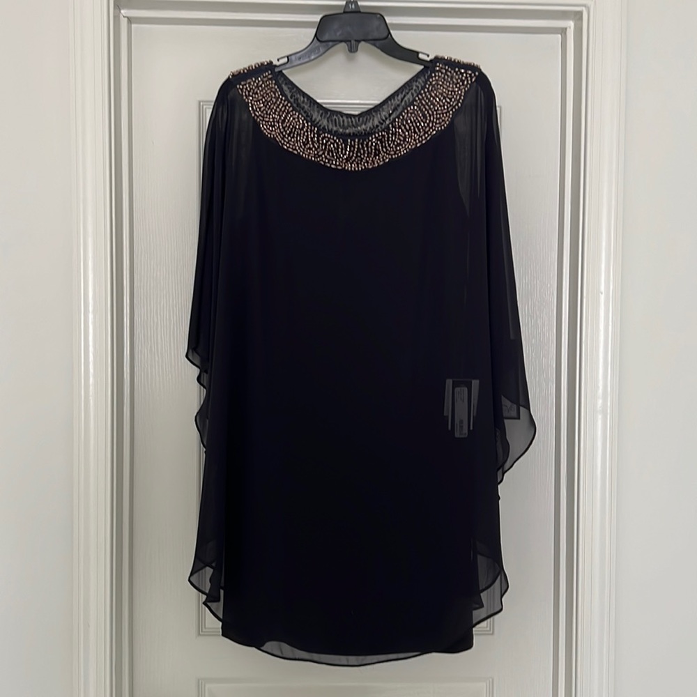 Navy dress. Great for a wedding attendee. Never worn with tags